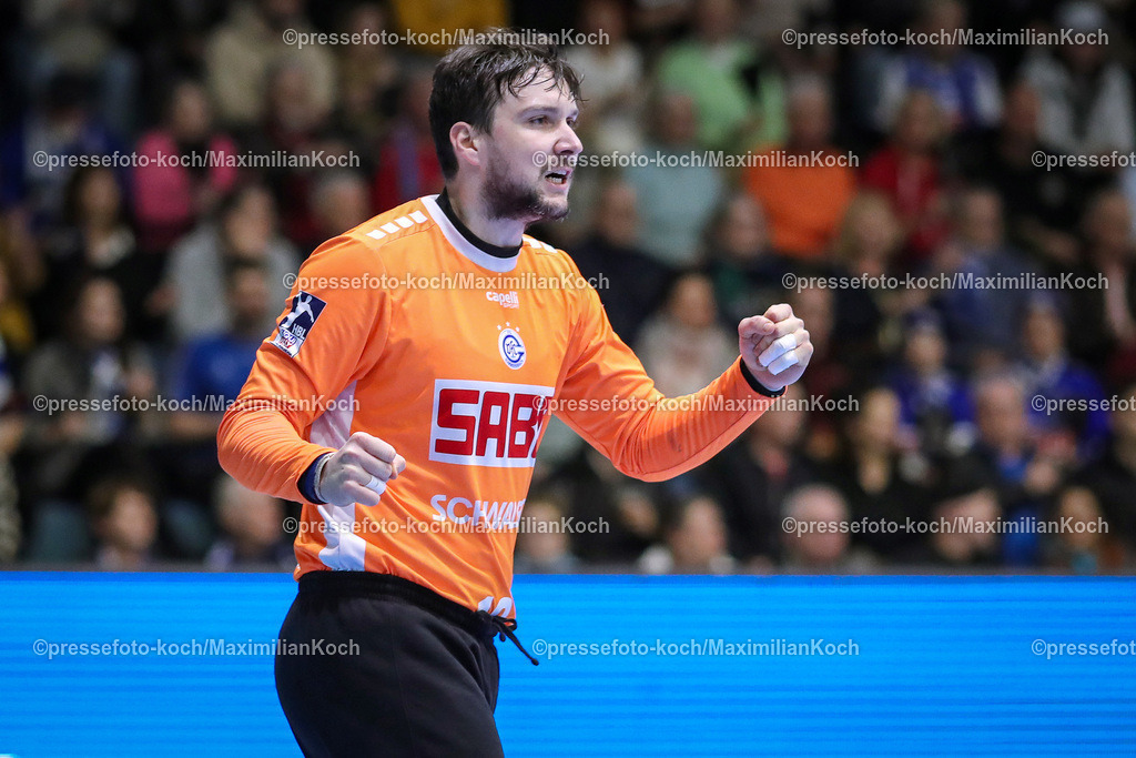 Gum1HBL19022401010 | 19.02.2024, Gummersbach, Handball, Liqui Moly Bundesliga, Schwalbe-Arena, VfL Gummersbach - SC DHfK Leipzig: Torhüter Daniel Rebmann (VfL Gummersbach) jubelnd