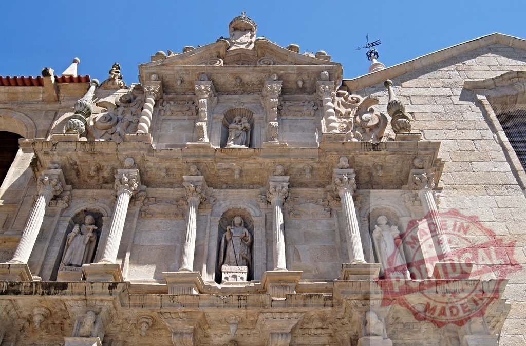 Baroque church facade with religious statues and ornate carvings | Baroque church facade displaying religious stone statues and detailed architectural elements - Realized with Pictrs.com