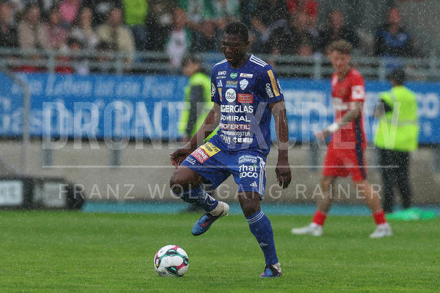 TSV Egger Glas Hartberg vs SK Rapid Wien – Championship Group    | Hartberg, Austria, 19.Apr.26 - SOCCER - ADMIRAL Bundesliga, TSV Egger Glas Hartberg vs SK Rapid Wien. The image shows Youba Diarra (Hartberg) in rain. 