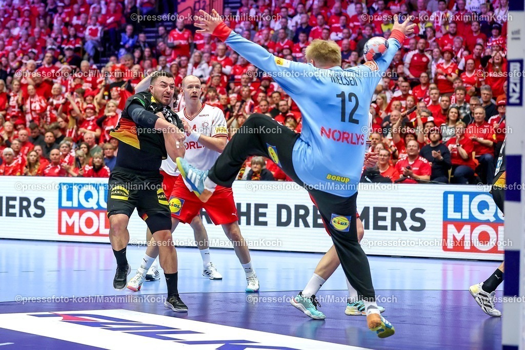 EHF26012603032 | 26.01.2026, Handball, Men's EHF EURO 2026, Deutschland - Dänemark, Jyske Bank Boxen in Herning, Dänemark, Main Round:  Emil Nielsen (Denmark #12) pariert den Wurf von  Jannik Kohlbacher (Germany #80)