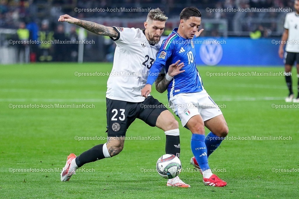 DFB23032501089 | 23.03.2025, Fußball, Viertelfinale UEFA Nations League, Deutschland - Italien, Signal Iduna Park, Saison 2024 2025: Robert Andrich (GER #23) im Zweikampf gegen Giacomo Raspadori (ITA #10) DFB regulations prohibit any use of photographs as image sequences and or quasi-video.