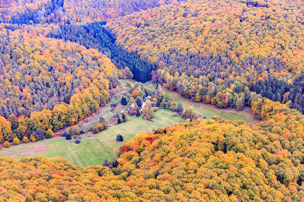 Aerial view: Guensthal district with in Windstein in the state Bas-Rhin, France. – Photo: IMG_084629.jpg taken on 10/23/2015 by Werner Riehm/FLY-FOTO.com – Resolution of the original: 5472 x 3648 px