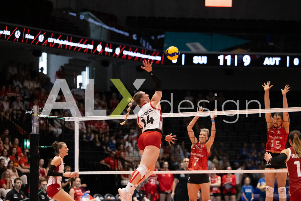 Austria v Switzerland - CEV European League Women | KRIENS, SWITZERLAND - JUNE 14: KORA MARINA SCHABERL of Austria attack / spike against MÉLINE PIERRET of Switzerland and ALIX DE MICHELI of Switzerland double block during the CEV European League match between Austria and Switzerland at Pilatus Arena on June 14, 2026 in Kriens, Switzerland. - Realisiert mit Pictrs.com