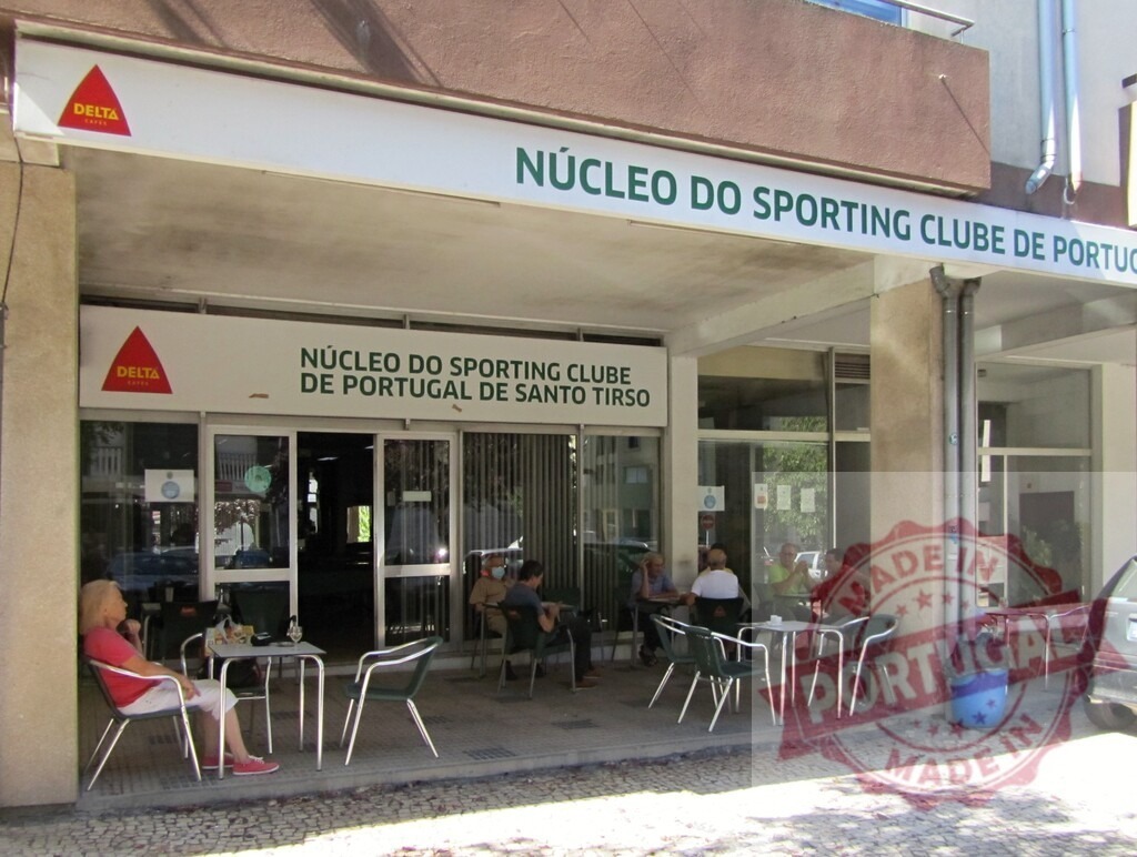 Núcleo do Sporting Clube de Portugal de Santo Tirso cafe | People enjoying coffee outdoors at a Sporting CP club in Santo Tirso, Portugal - Realized with Pictrs.com