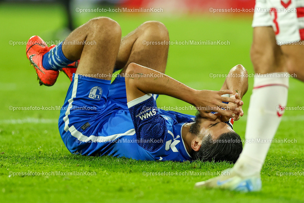 Koe14092402209 | 14.09.2024, 2. Fußball Bundesliga, 1. FC Köln - 1. FC Magdeburg, RheinEnergieSTADION, Saison 2024 2025: Mohammed El Hankouri (1.FC Magdeburg #11) liegt auf dem SpielfeldDFB regulations prohibit any use of photographs as image sequences and or quasi-video.