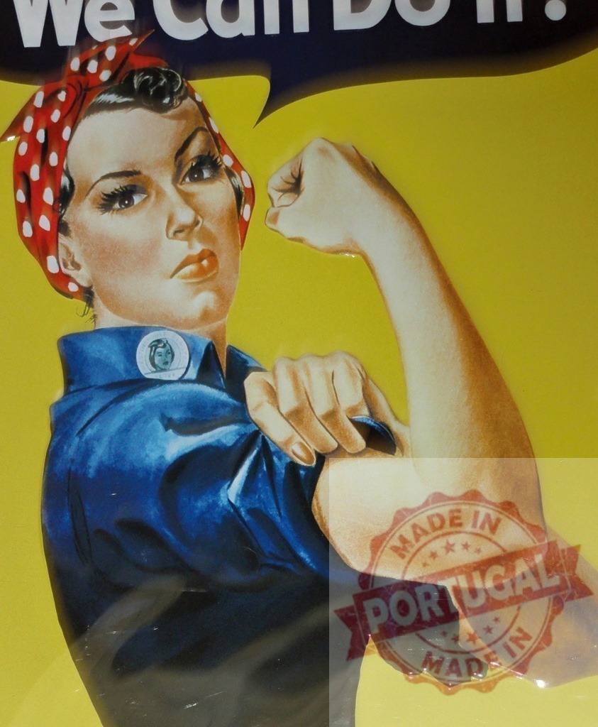 Rosie the Riveter showing strength, We Can Do It! | Rosie the Riveter flexing arm representing female empowerment and determination from World War II - Realized with Pictrs.com