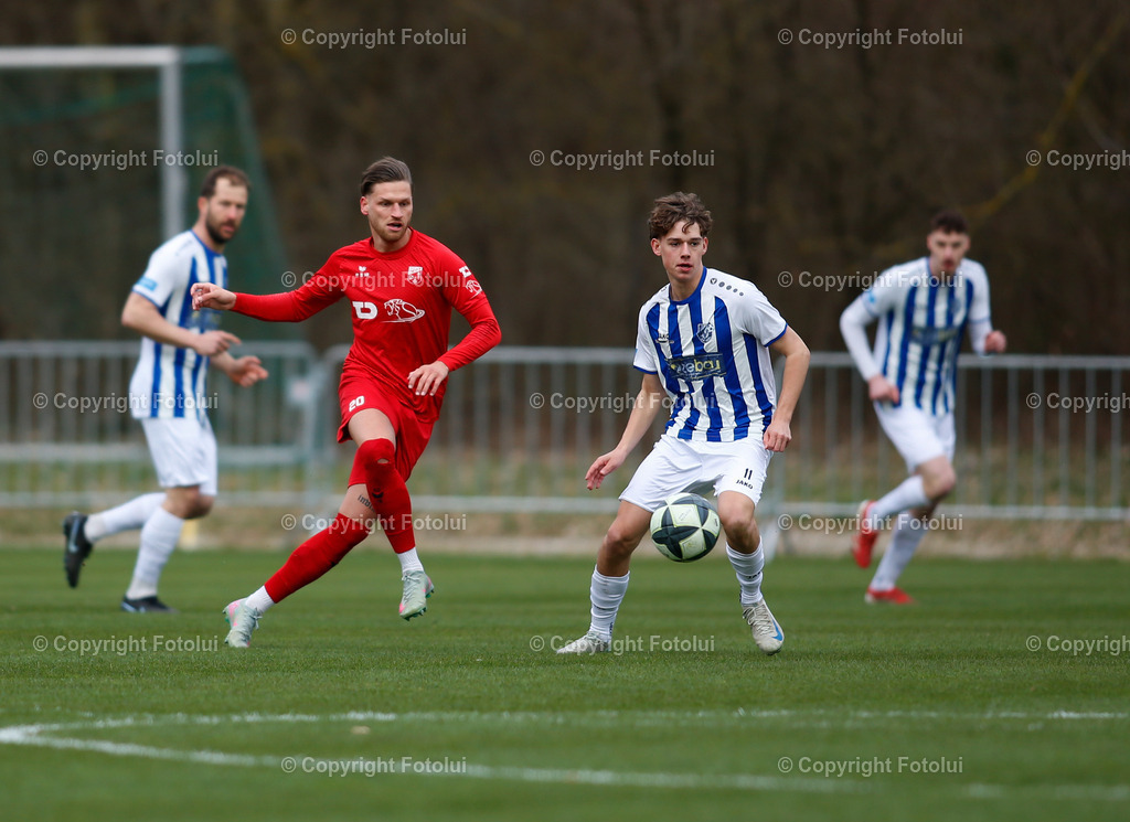 A_LUI_28032026_02 | SPORT,FUSSBALL, LT1 OOE LIGA ASKOE OEDT 1B-SV ZEBAU BAD ISCHL 28.03.2026 IM BILD: MICHAEL LEONHARTSBERGER (OEDT1B) UND KILLIAN EISL (BAD ISCHL) FOTO:FOTLUI 