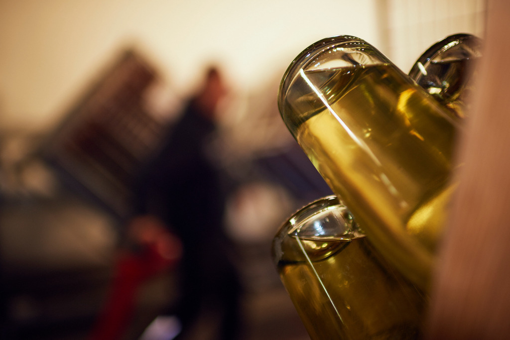 Sektkellerei Szigeti | Gols, Austria - February 19, 2018: Sektkellerei Szigeti; mehrere Sektflaschen im Rüttelbrett. - Realisiert mit Pictrs.com