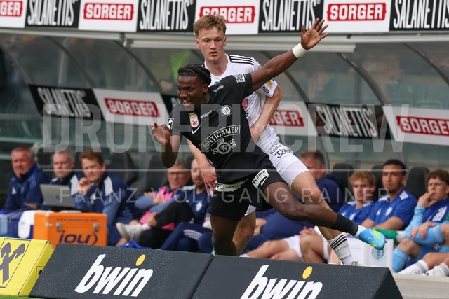 SK Puntigamer Sturm Graz vs TSV Egger Glas Hartberg – Championship Group    | Graz, Austria, 12.Apr.26 - SOCCER - ADMIRAL Bundesliga, SK Puntigamer Sturm Graz vs TSV Egger Glas Hartberg. The image shows Seedy Jatta (STU) and Konstantin Schopp (Hartberg).    