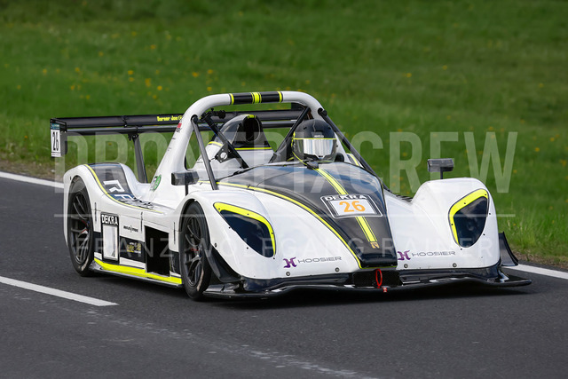 Rechberg Hill Climb 2025 – FIA European Hill Climb Championship | Rechberg Hill Climb 2025, part of the FIA European Hill Climb Championship. High-speed racing action, mountain scenery, atmosphere and pure motorsport passion captured in detail. The image shows Juergen FROMMKNECHT (GER) Radical SR3 RSX Suzuki.          