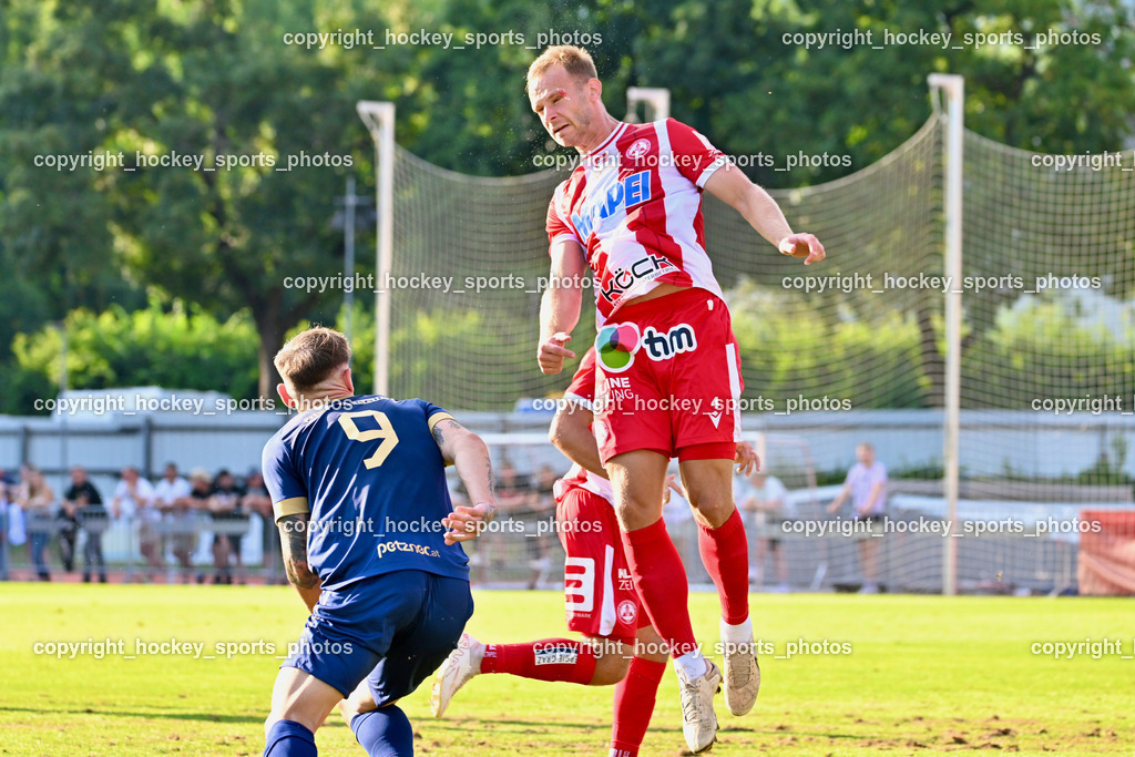 ATUS Velden vs. GAK | #9 Tom Zurga ATUS Velden, #4 Martin Kreuzriegler GAK, ATUS Velden vs. GAK, ATUS Velden vs. GAK am 26.07.2024 in Villach (Stadion Lind), Austria, (Photo by Bernd Stefan)