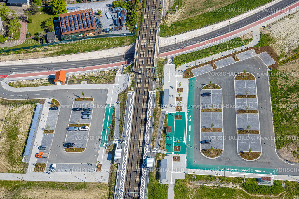 Hamm250500602 | Luftbild, geplante Nahverkehrsverbindung mit Haltepunkt in Westtünnen, Baustelle am Südfeldweg und Von-Thünen-Straße für den künftigen Bahnhaltepunkt, Bahnlinie mit Eisenbahnbrücke, Parkplätze, Stadtbezirk Rhynern, Hamm, Ruhrgebiet, Nordrhein-Westfalen, Deutschland