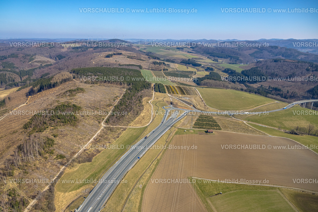 HB-Bestwig220303010 | Luftbild, Autobahn A46 mit Kreisverkehr auf die Bundesstraße B480 mit weitläufiger Landschaft, Nuttlar, Bestwig, Sauerland, Nordrhein-Westfalen, Deutschland