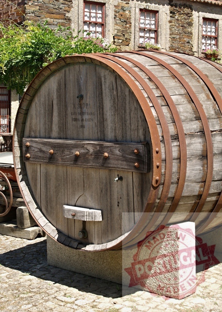 Old wooden wine barrel representing tradition and winemaking | Aged wooden wine barrel outdoors, displaying rustic charm and winemaking heritage - Realisiert mit Pictrs.com