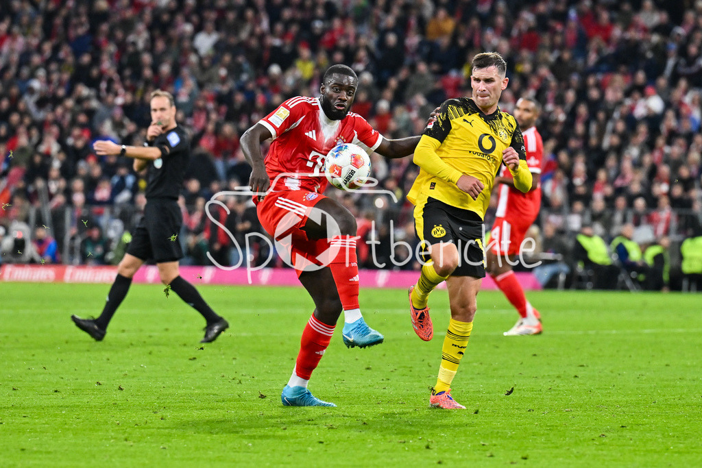 FC Bayern München - Borussia Dortmund | mUNICH, GERMANY - Dayot UPAMECANO (FC Bayern Munich 2) against Pascal GROSS (Borussia Dortmund 13) during the bundesliga match between FC Bayern Munich vs. Borussia Dortmund on matchday 7 at Allianz Arena on October 18, 2025 in Munich, Germany / DFL REGULATIONS PROHIBIT ANY USE OF PHOTOGRAPHS AS IMAGE SEQUENCES AND/OR QUASI-VIDEO