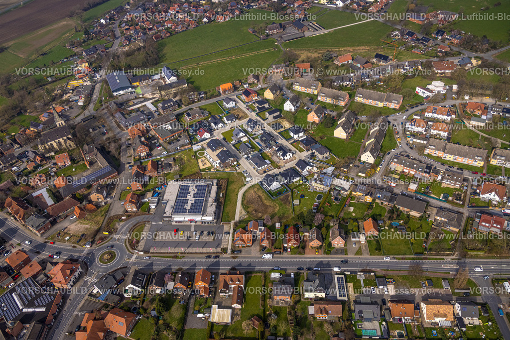Ahlen240306142Dolberg | Luftbild, Wohngebiet Ortsansicht Ortsteil Dolberg, neuer REWE Supermarkt mit Solardach, Windräder, neuer Kreisverkehr Alleestraße und Uentroper Straße, Neubau Wohngebiet Hases Wiese, kath. St. Lambertus KIrche, Ahlen, Dolberg, Ruhrgebiet, Deutschland