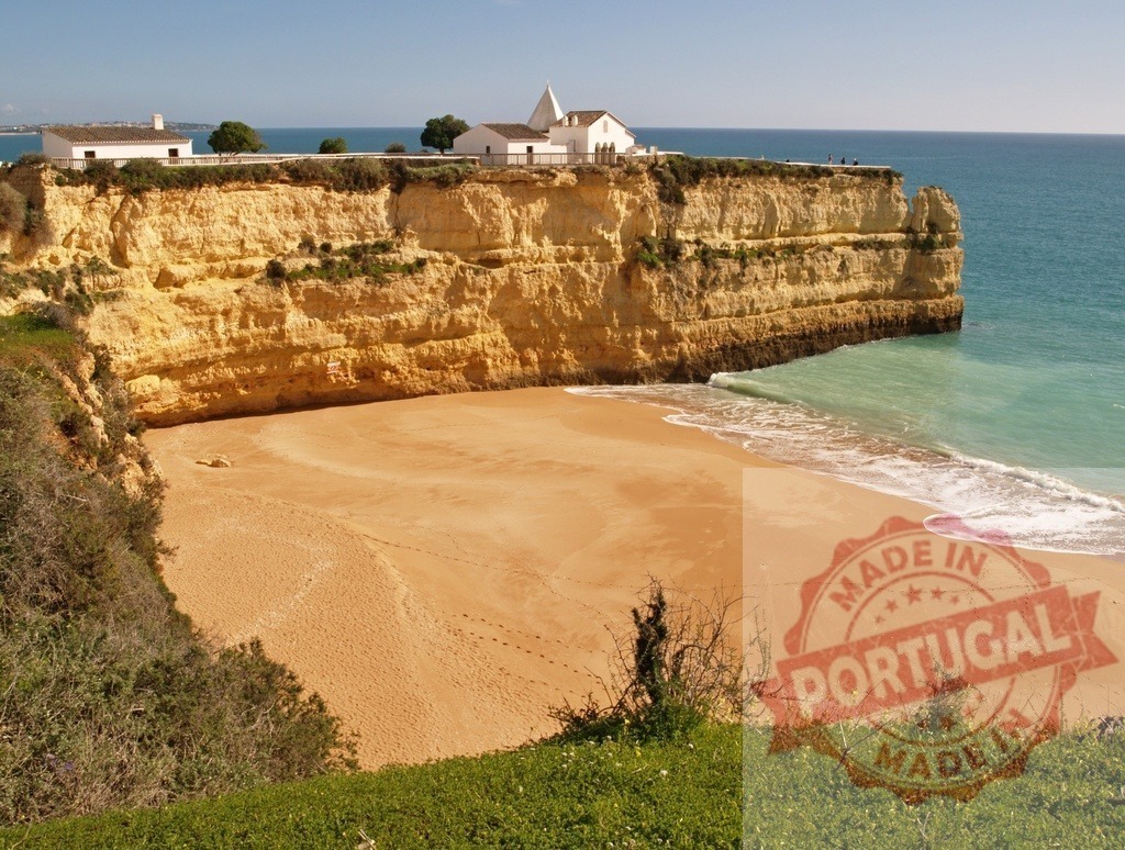 Senhora da Rocha chapel overlooking Algarve coastline beach | Senhora da Rocha chapel perched on golden cliffs with a sandy beach and turquoise ocean below - Realized with Pictrs.com