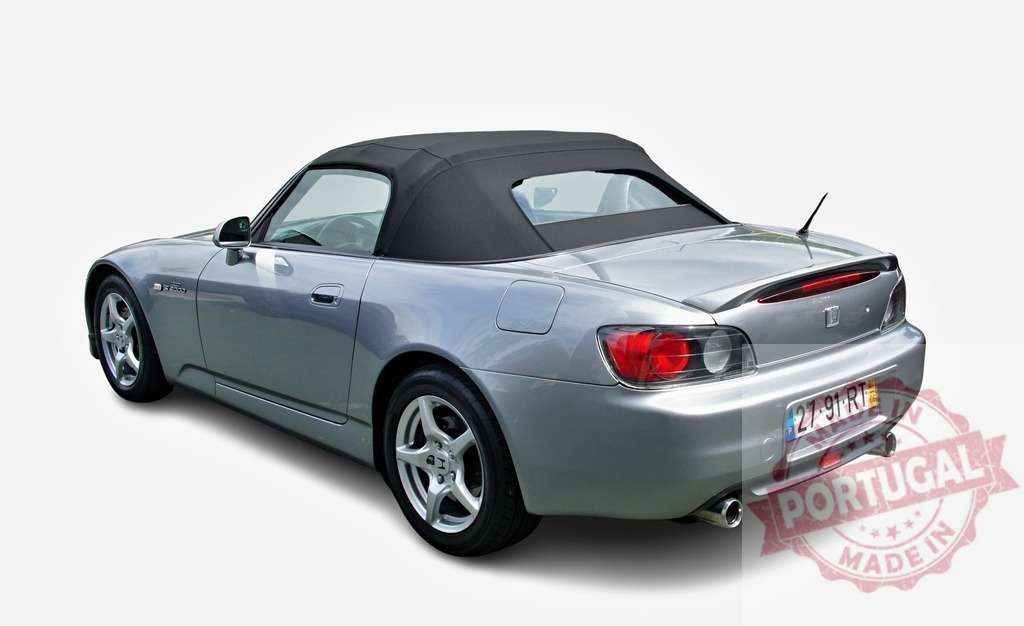 Honda S2000 silver sports car isolated background | Honda S2000 silver convertible sports car with black soft top on white background - Realized with Pictrs.com