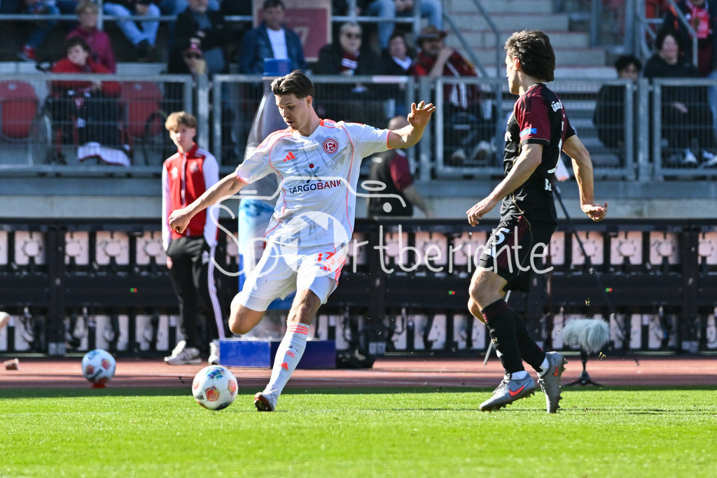 1. FC Nürnberg - Fortuna Düsseldorf | NUREMBERG, GERMANY - 07. MARCH:  im Duell Cedric ITTEN (Fortuna Düsseldorf 13) und Tom BAACK (1. FC Nuernberg 5) während dem Match zwischen dem 1. FC Nürnberg und Fortuna Düsseldorf am 25. Spieltag der 2. Bundesliga im Max Morlock Stadion / DFL REGULATIONS PROHIBIT ANY USE OF PHOTOGRAPHS AS IMAGE SEQUENCES AND/OR QUASI-VIDEO