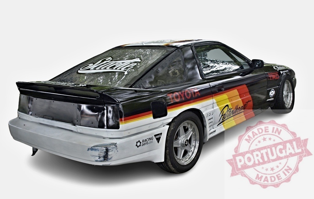 Tuned Toyota Supra Drift Car Sporting German Flag Colors | Customized Toyota Supra drift car featuring German flag color scheme and racing modifications - Realisiert mit Pictrs.com