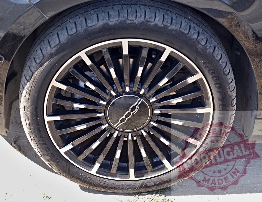 Fiat 500 car wheel with Goodyear tire | Fiat 500 car wheel with a black and silver alloy rim and new tire - Realized with Pictrs.com