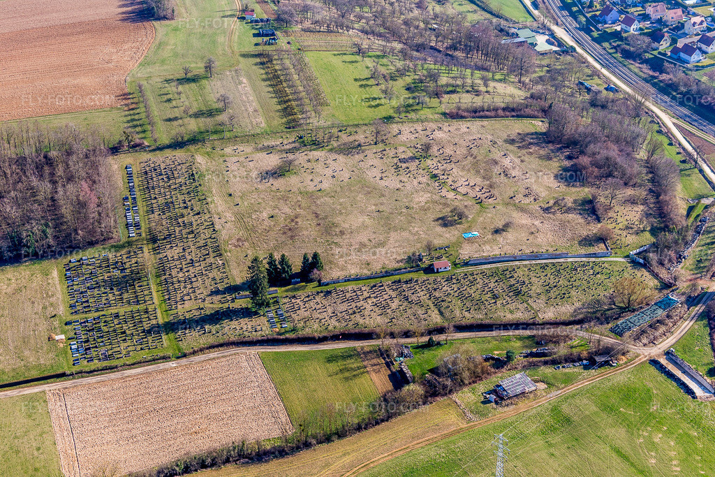 Aerial view: Cemetery in Ettendorf in the state Bas-Rhin, France. – Photo: IMG_097506.jpg taken on 03/16/2017 by Werner Riehm/FLY-FOTO.com – Resolution of the original: 5472 x 3648 px
