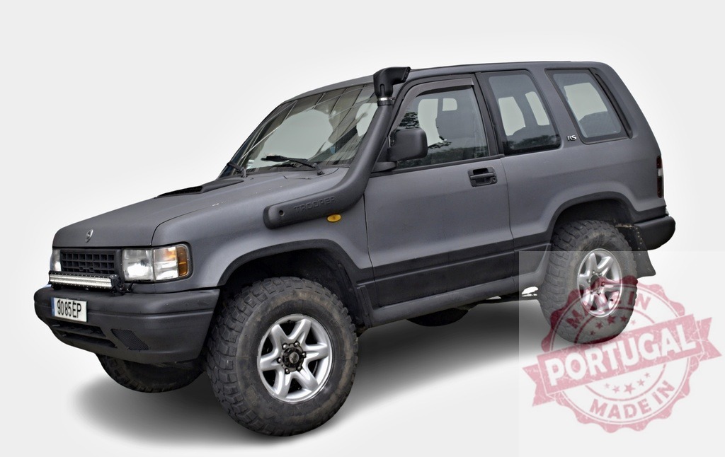 Isuzu Trooper showing off-road modifications for challenging terrains | Gray Isuzu Trooper featuring off-road upgrades, including a snorkel and all-terrain tires, ready for adventure - Realized with Pictrs.com