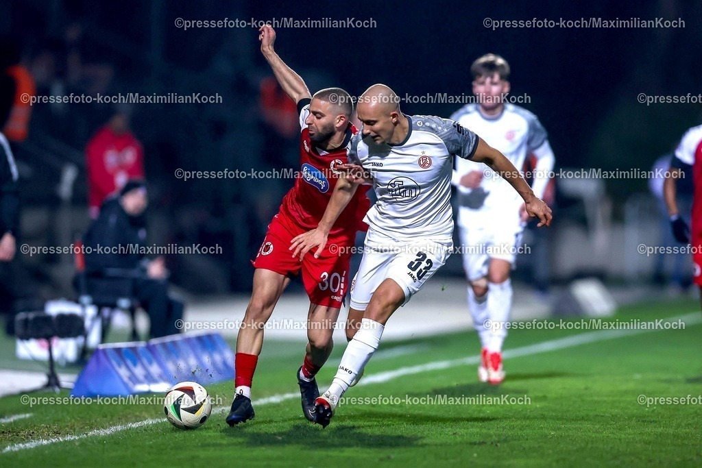 Koe12032501088 | 12.03.2025, Fußball, FC Viktoria Köln – Rot-Weiss Essen, 3.Liga, Sportpark Höhenberg, Saison 2024 2025: Serhat-Semih Güler (Viktoria Köln #30) im Zweikampf gegen Tobias Kraulich (RWE #33) DFB regulations prohibit any use of photographs as image sequences and or quasi-video.
