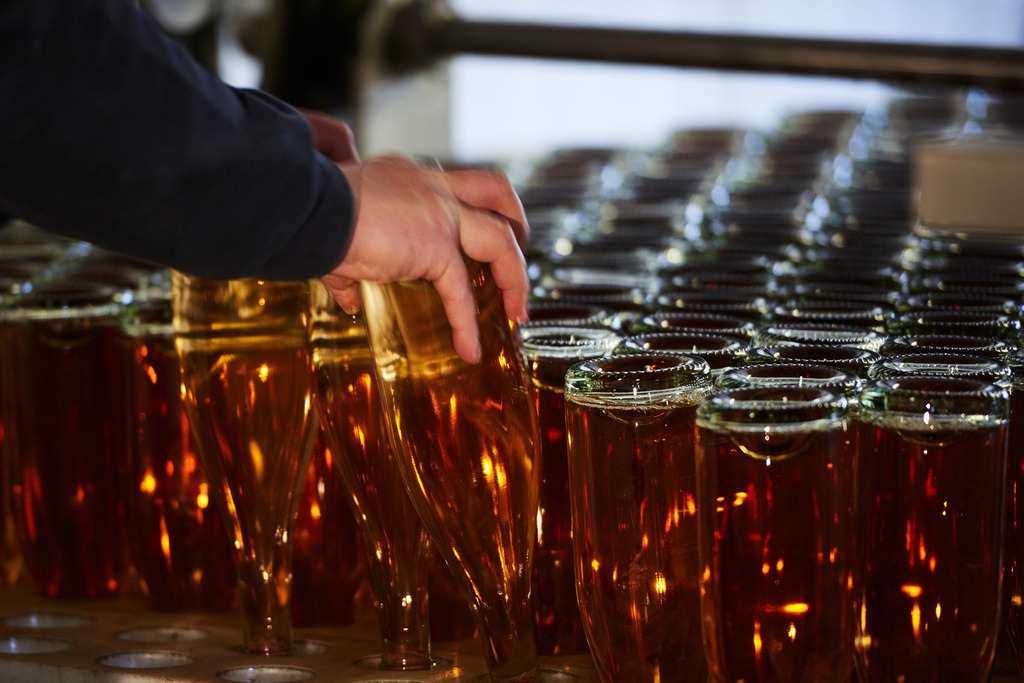 Sektkellerei Szigeti | Gols, Austria - February 19, 2018: Sektkellerei Szigeti; zur Entfernung der Hefereste, das Degorgieren, werden die Sektflaschen durch ein minus 22 Grad kaltes Solebad gezogen. - Realisiert mit Pictrs.com