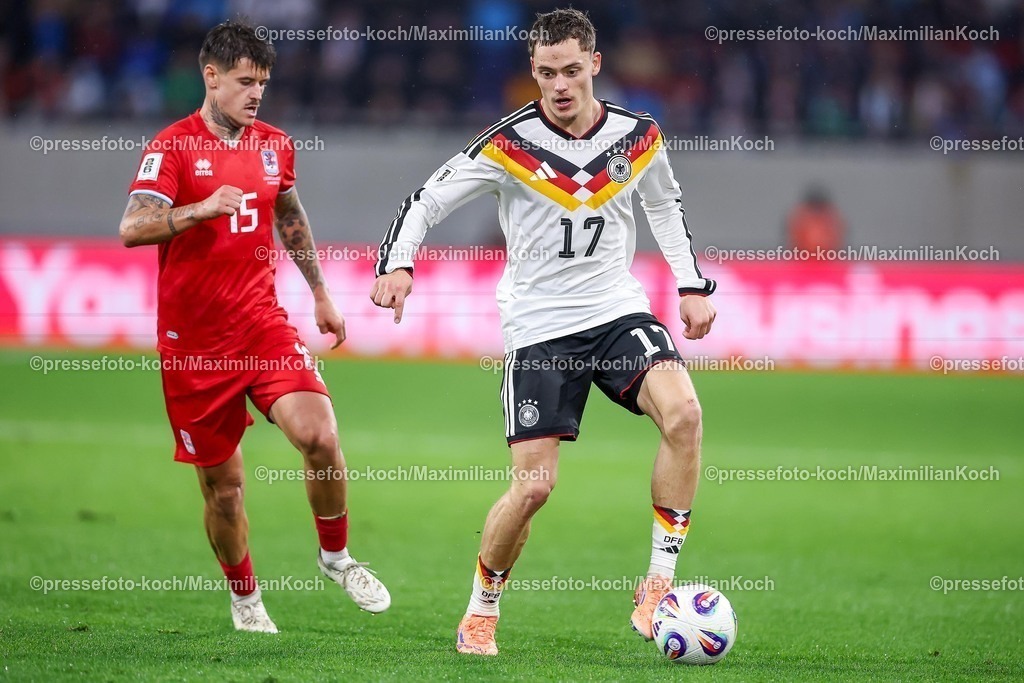 DFB14112501116 | 14.11.2025, Fußball, Länderspiel, WM-Qualifikation Europa, Deutschland - Luxemburg, Stade de Luxembourg (Croix de Gasperich, Luxemburg), 9. Spieltag, Saison 2025 2026: Olivier Thill (LUX #15) im Zweikampf gegen  Florian Wirtz (GER #17)  Regulations prohibit any use of photographs as image sequences and or quasi-video.