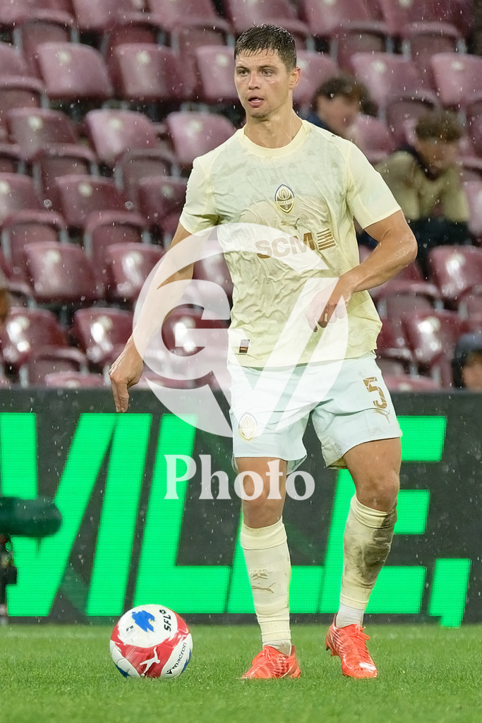 UEFA Conference League Play-offs 2nd leg - Servette FC v FC Shakhtar Donetsk | Valeriy Bondar (5 FC Shakhtar Donetsk) controls the ball (action)  during the UEFA Conference League Play-offs 2nd leg match between Servette FC and FC Shakhtar Donetsk at Stade de Geneve in Geneva, Switzerland