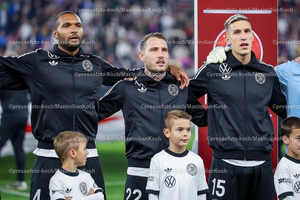 DFB10102502138 | 10.10.2025, Fußball, Länderspiel, Deutschland - Luxemburg, UEFA WM-Qualifikation, 2025/2026, Gruppe A, PreZero Arena in Sinsheim: Jonathan Tah (GER #04) neben David Raum (GER #22) und Nico Schlotterbeck (GER #15) bei der NationalhymneDFB regulations prohibit any use of photographs as image sequences and or quasi-video.
