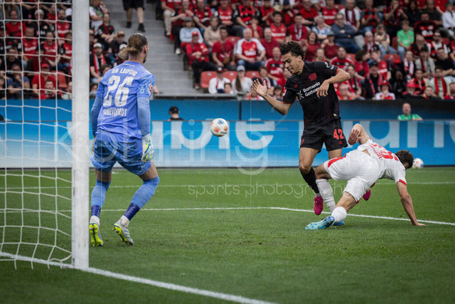 German Bundesliga, Bayer 04 Leverkusen vs. RB Leipzig, 02.05.2026 | LEVERKUSEN, GERMANY - MAY 2, 2026 :  Montrell Amare Culbreath  (Bayer 04 Leverkusen, 42) tackled by Max Finkgraefe (Finkgrafe, Finkgräfe, RB Leipzig, 35), Keeper Maarten Vandevoordt(RB Leipzig, 26) watches the scene during the German Bundesliga match on gameday 32 between Bayer 04 Leverkusen vs. RB Leipzig at BayArena on May 2, 2026 in Leverkusen, Germany. DFL REGULATIONS PROHIBIT ANY USE OF PHOTOGRAPHS AS IMAGE SEQUENCES AND/OR QUASI-VIDEO.