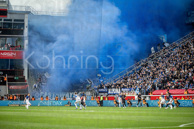 German Bundesliga, Bayer 04 Leverkusen vs. Hamburger SV, 16.05.2026 | LEVERKUSEN, GERMANY - MAY 16, 2026 :  blue smoked fan corner of Hamburg during the German Bundesliga match on gameday 34 between Bayer 04 Leverkusen vs. Hamburger SV at BayArena on May 16, 2026 in Leverkusen, Germany. DFL REGULATIONS PROHIBIT ANY USE OF PHOTOGRAPHS AS IMAGE SEQUENCES AND/OR QUASI-VIDEO.