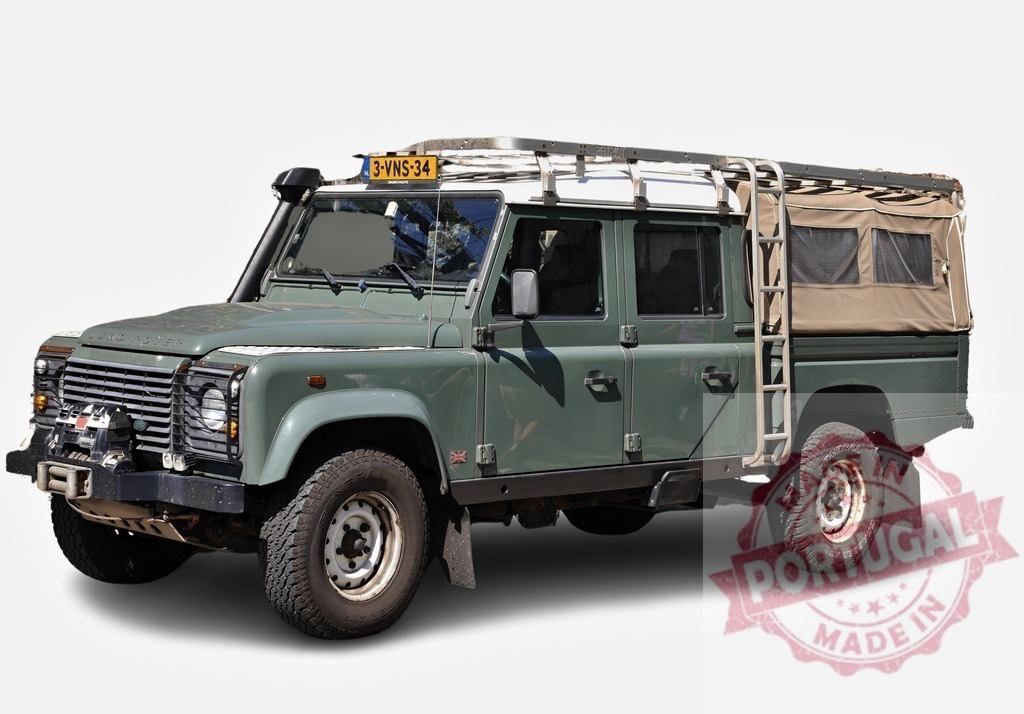 Land Rover Defender, customized for expeditions, is parked on a white background | Powerful custom Land Rover Defender, equipped for off-road adventures and expeditions, isolated on white - Realized with Pictrs.com