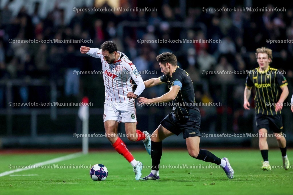 FKo26022601012 | 26.02.2026, Fußball, Landespokal Mittelrhein, SC Fortuna Köln - TSV Alemannia Aachen, Südstadion, Viertelfinale Bitburger-Pokal, Saison 2025 2026: Hamadi Al-Ghaddioui&nbsp; (SC Fortuna Köln #18) im Zweikampf gegen  Sasa Strujic&nbsp; (Alemannia Aachen #05)  DFB regulations prohibit any use of photographs as image sequences and or quasi-video.