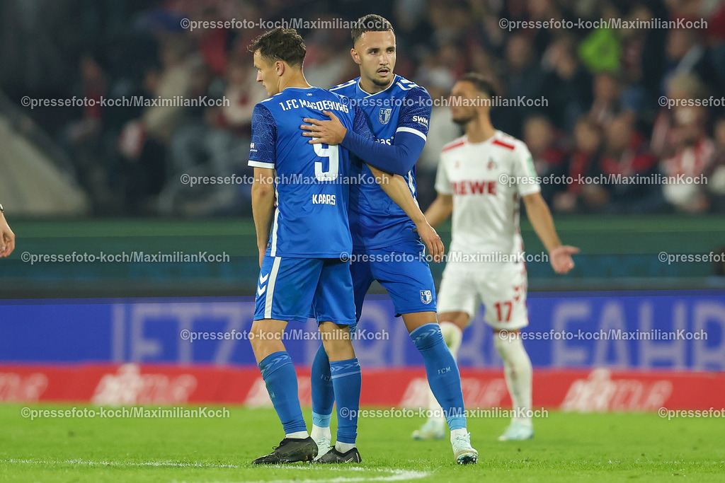 Koe14092401035 | 14.09.2024, 2. Fußball Bundesliga, 1. FC Köln - 1. FC Magdeburg, RheinEnergieSTADION, Saison 2024 2025: Torjubel nach dem 1:1 durch Falko Michel (1.FC Magdeburg #21) zusammen mit Martijn Kaars (1.FC Magdeburg #9)DFB regulations prohibit any use of photographs as image sequences and or quasi-video.