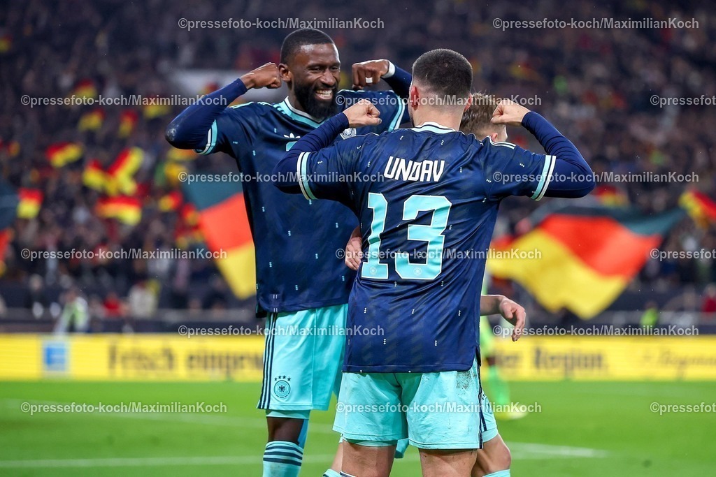 DFB30032600088 | 30.03.2026, Fußball, Länderspiel, Deutschland - Ghana, MHP-Arena (Stuttgart), Saison 2025 2026: Torjubel nach dem Tor zum 2:1 durch Torschütze Deniz Undav (GER #13)  zusammen mit Antonio Rüdiger (GER #02)    DFB regulations prohibit any use of photographs as image sequences and or quasi-video.