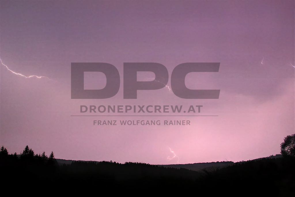 Lightning Storm over the Almenland | Multiple lightning strikes illuminate the night sky over the Almenland region in Austria during a powerful summer thunderstorm. - Realisiert mit Pictrs.com