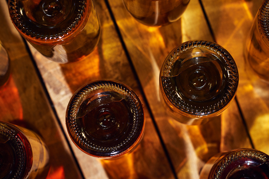 Sektkellerei Szigeti | Gols, Austria - February 19, 2018: Sektkellerei Szigeti; mehrere Sektflaschen in einem Rüttelbrett. - Realisiert mit Pictrs.com