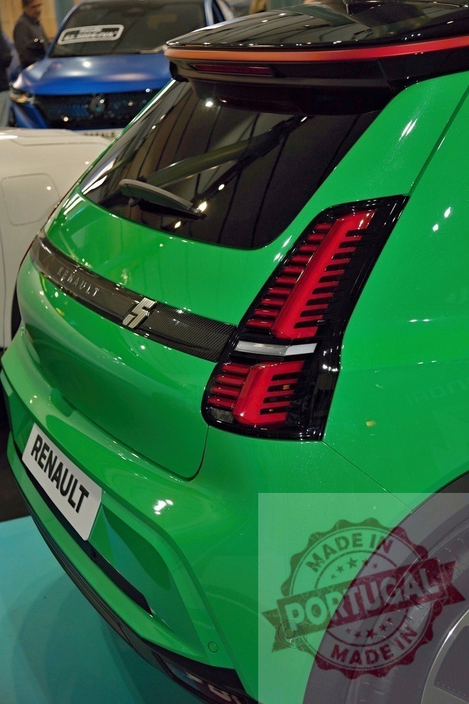 Renault 5 E-Tech EV electric car design showing rear light | Rear view of a green Renault 5 E-Tech electric car tail light and modern design - Realized with Pictrs.com