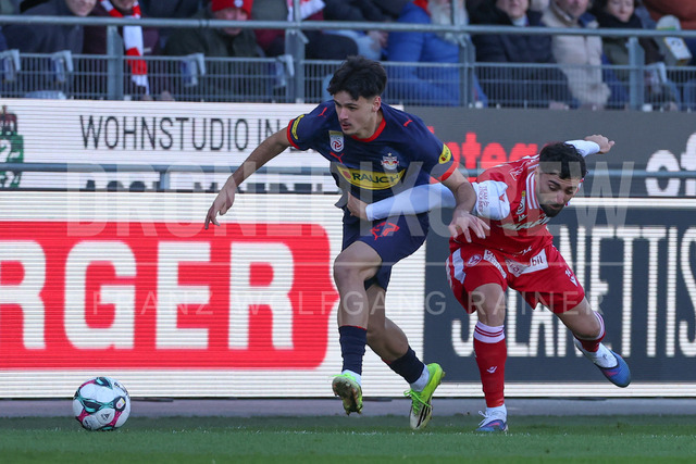 Grazer AK 1902 vs FC Red Bull Salzburg – Austrian Bundesliga | Graz, Austria, 15.Feb.26 - SOCCER - ADMIRAL Bundesliga, Grazer AK 1902 vs FC Red Bull Salzburg. The image shows Kerim Alajbegovic (Red Bull Salzburg) and Jacob Italiano (GAK).