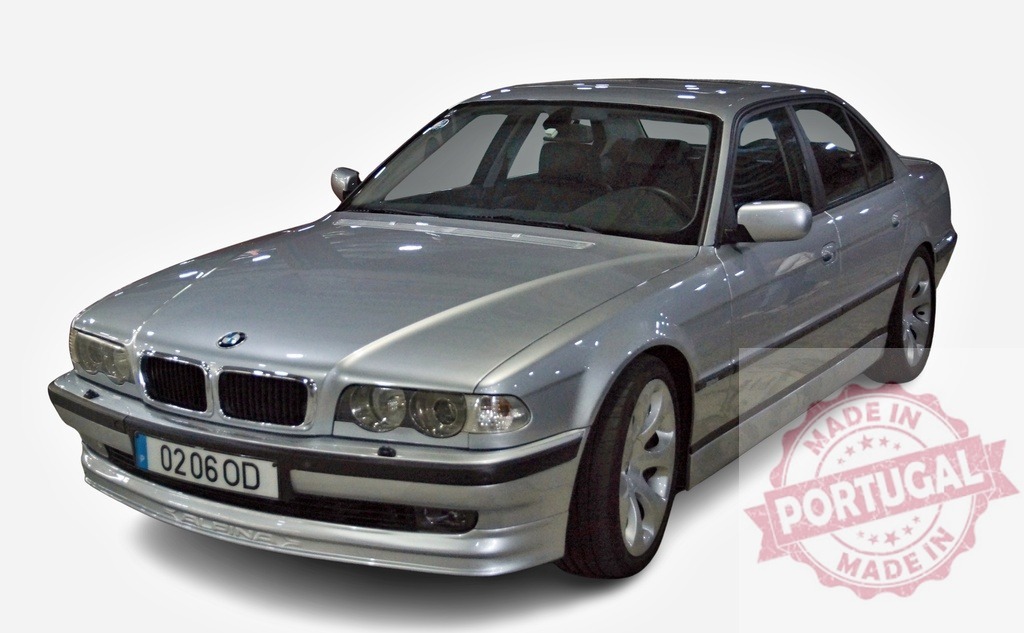 Silver BMW 7 Series E38 sedan driving | Luxury German car moving on a white background, embodying speed and elegance - Realized with Pictrs.com