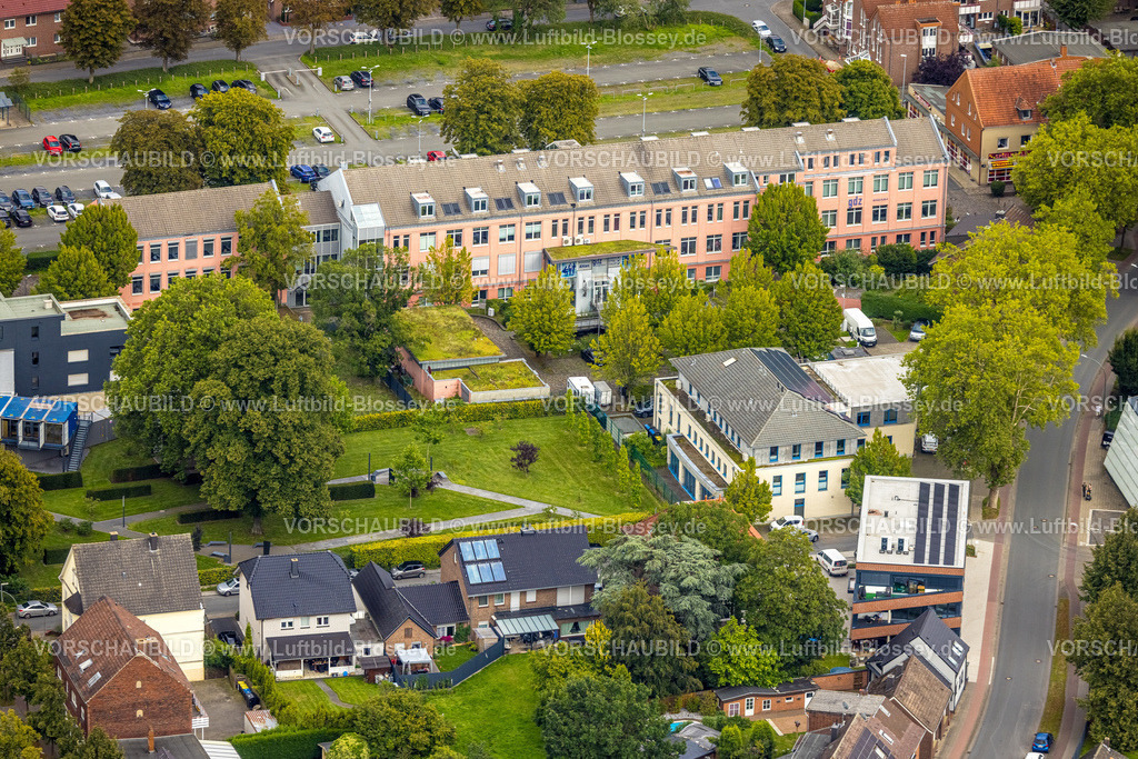 Ahlen230803338 | Luftbild, uftbild, Gründer- und Dienstleistungszentrum mit rosa Hausfassade, Caritas Sozialstation Ahlen, Ahlen, Ruhrgebiet, Nordrhein-Westfalen, Deutschland