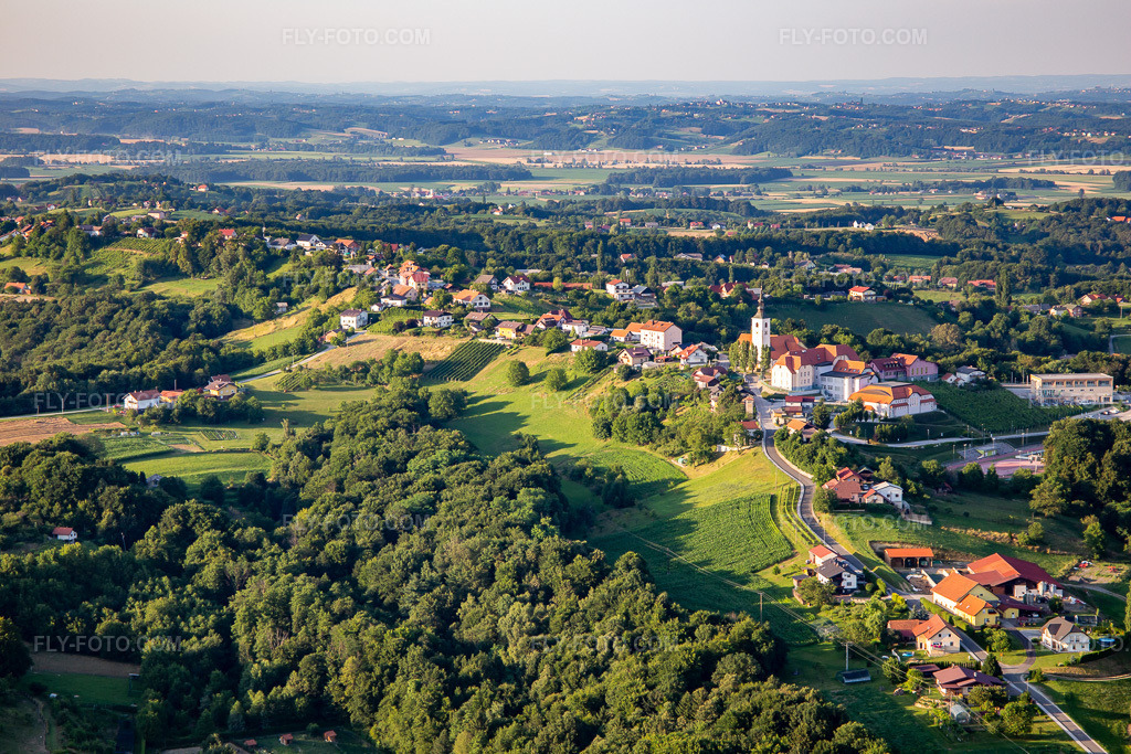 Aerial view: Church of Župnija Sv. Urban - Destrnik in the district Janežovski Vrh in Destrnik in the state Slovenia, Slovenia.Photo: IMG_137346.jpg taken on 07/08/2023 by Werner Riehm/FLY-FOTO.comResolution of the original: 5472 x 3648 px\x8eupniji Sv. Urban ~ Destrnik in Sv. Bolfenk v Slovenskih goricah ~ Trnovska vas