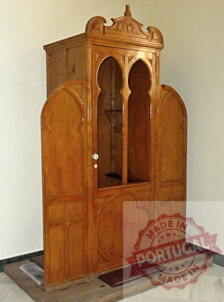Wooden Catholic confessional booth offering penitence and forgiveness | Empty wooden confessional booth used for sacrament of penance in a church - Realized with Pictrs.com