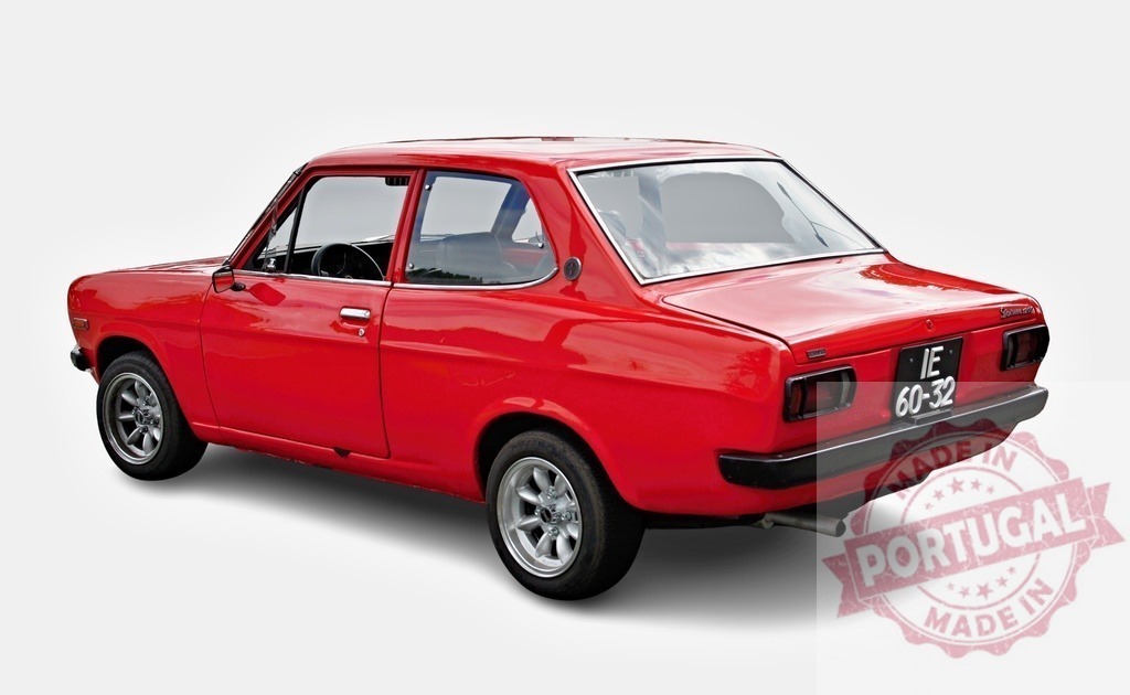 Datsun 1200 red vintage classic coupe car | Red Datsun 1200 classic vintage car displaying its retro design - Realized with Pictrs.com