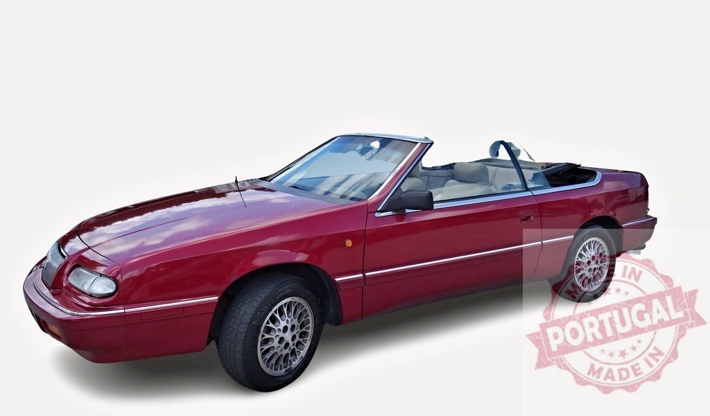 Red Chrysler LeBaron convertible parked with open roof on white background | Classic red Chrysler LeBaron convertible car parked with open roof on white background, representing american automotive design - Realized with Pictrs.com