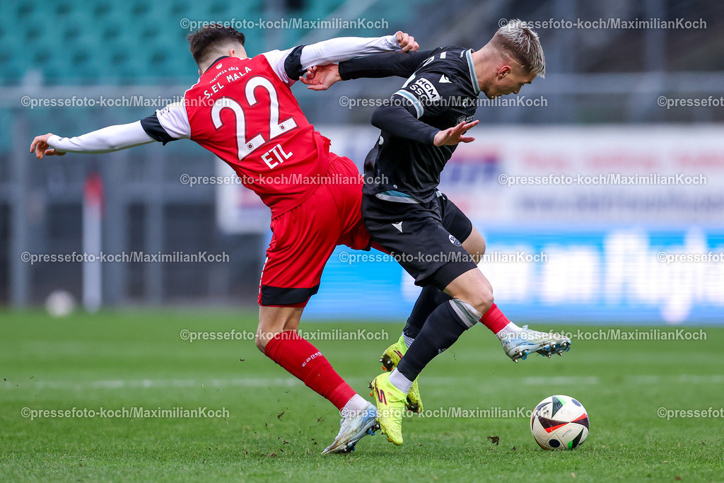 FCVK21122401013 | 21.12.2024, Fußball, FC Viktoria Köln – SV Sandhausen, 3.Liga, Sportpark Höhenberg, Saison 2024 2025: Said El Mala (Viktoria Köln #22) im Zweikampf gegen David Otto (Sandhausen #17)DFB regulations prohibit any use of photographs as image sequences and or quasi-video.