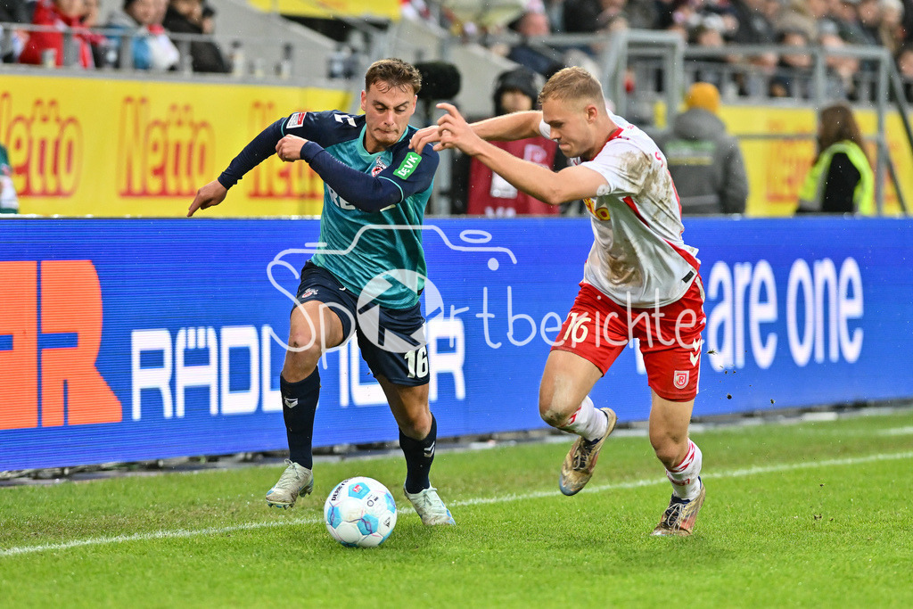 SSV Jahn Regensburg - 1. FC Köln | im Duell Marvin Ayhan OBUZ (1. FC Koeln 16) und Louis BREUNING (SSV Jahn Regensburg 16) / Zweikampf / 2. Bundesliga: SSV Jahn Regensburg - 1. FC Koen, Jahnstadion am 08.12.2024